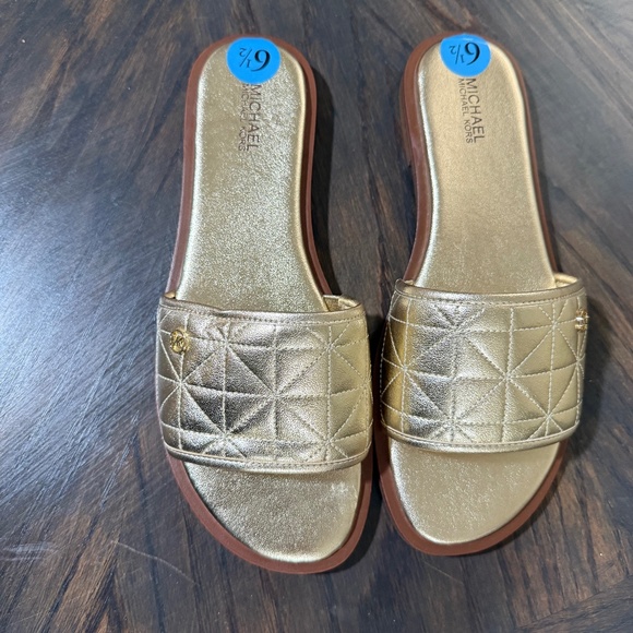 Michael Kors Shoes - Brand new Michael Kors gold flats